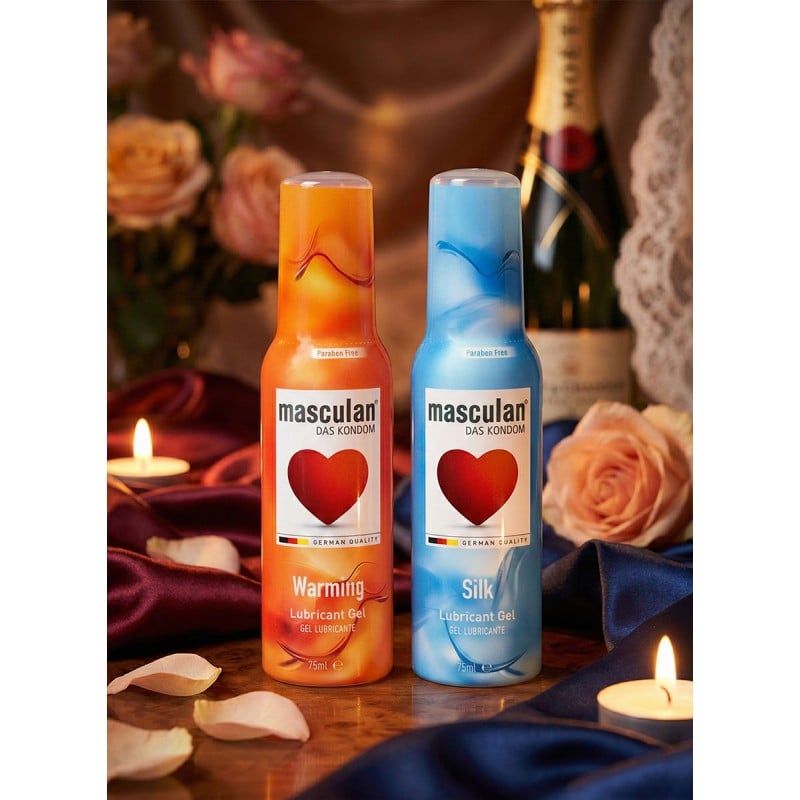 Два прозрачных тюбика Masculan Silk и Warming по 75 мл на белом фоне