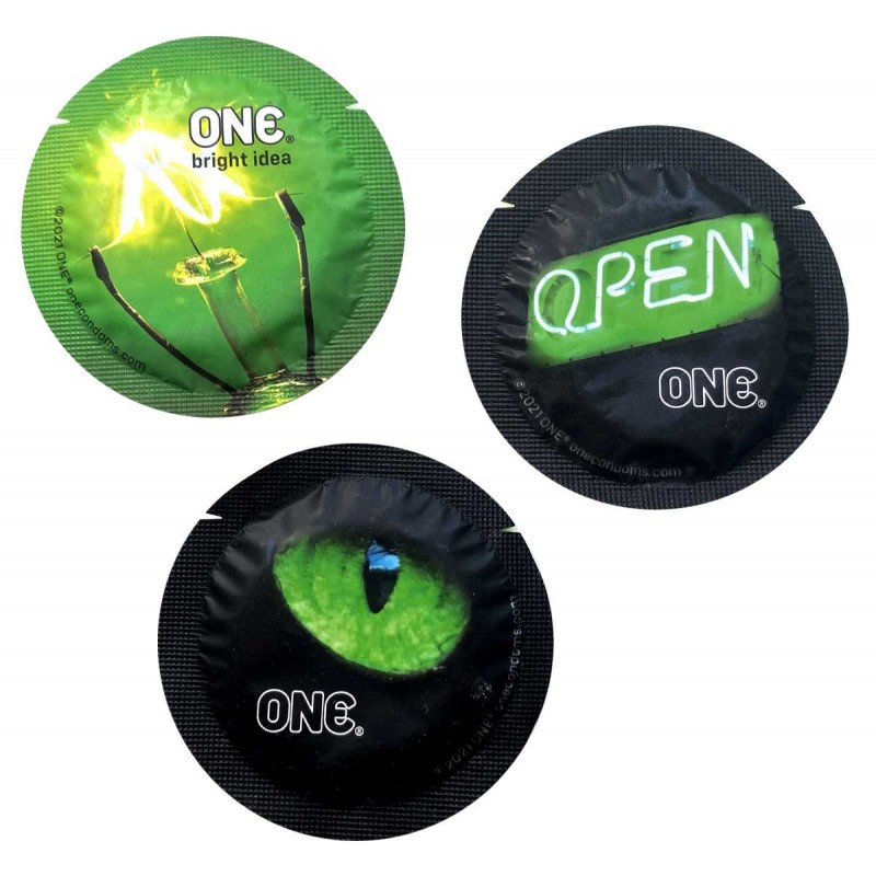 Чорна кругла упаковка ONE Glowing з жовто-зеленим написом, 1 презерватив, світиться в темряві