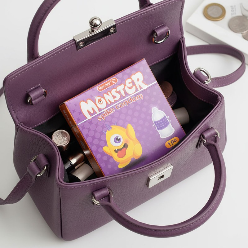 Фіолетова упаковка Recare Monster Violet Boo з написом Spike Condom та зображенням шипів