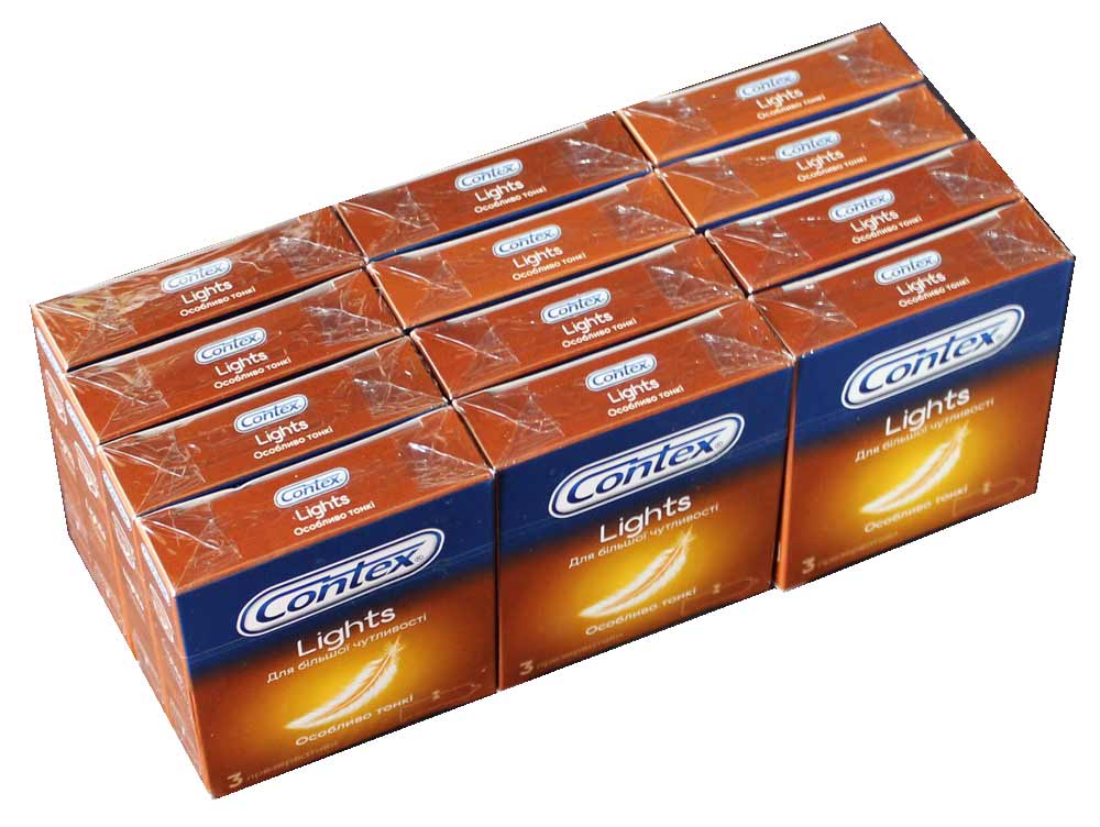 Несколько коробок Contex Lights Ultra Thin с голубым и серебристым оформлением, 12 пачек по 3 штуки