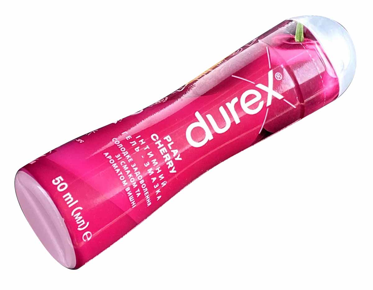 Прозрачный флакон с ярко-красной жидкостью DUREX Cherry 50мл, надпись и вишня спереди