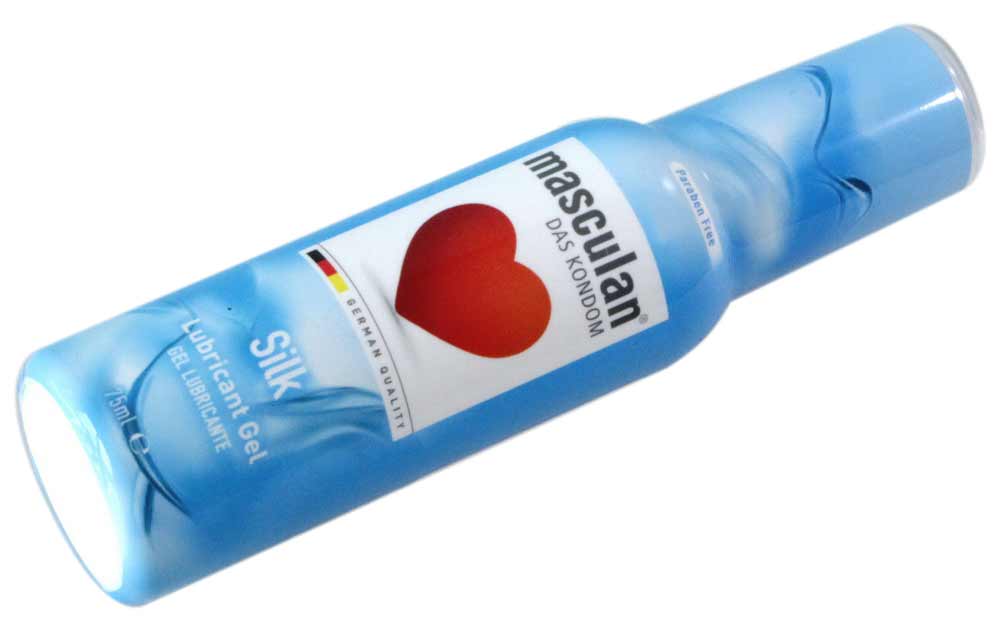 Прозрачный флакон с синим колпачком и надписью Masculan Silk 75 мл увлажняющий