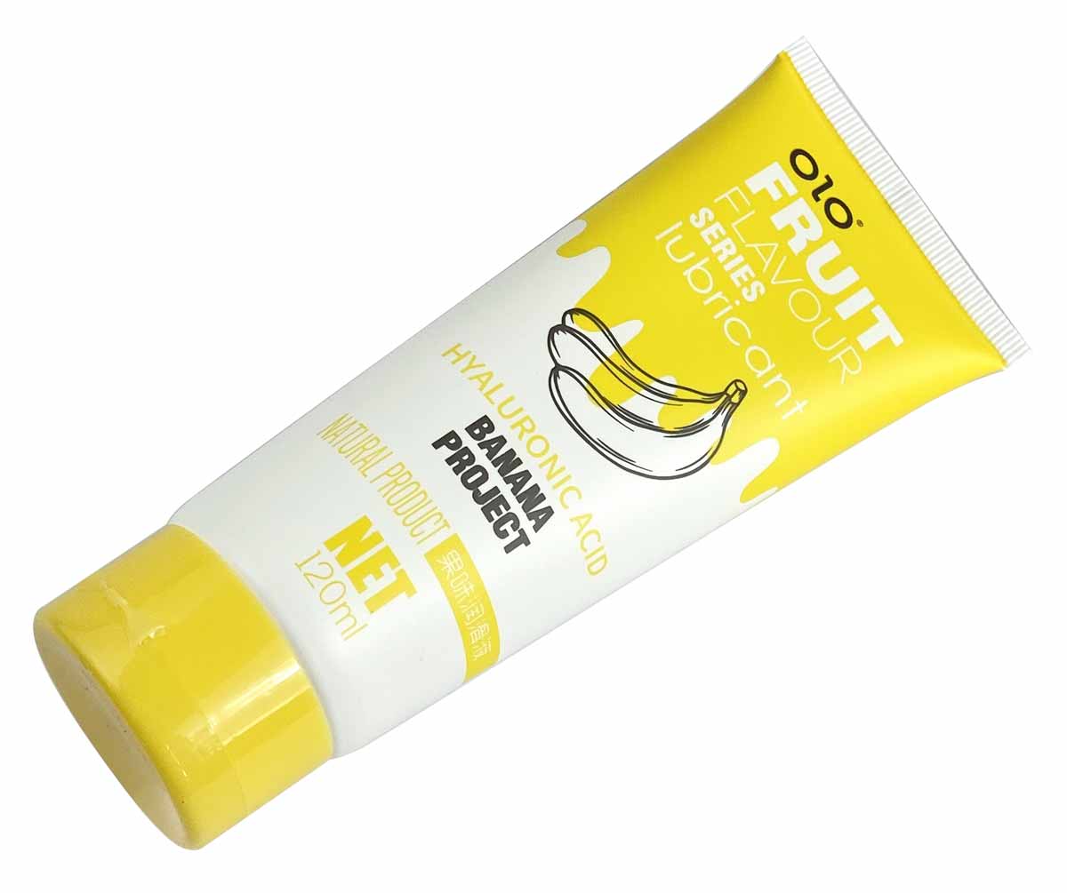 Желтая бутылка с лубрикантом OLO Banana, надпись и банан, объем 120 мл