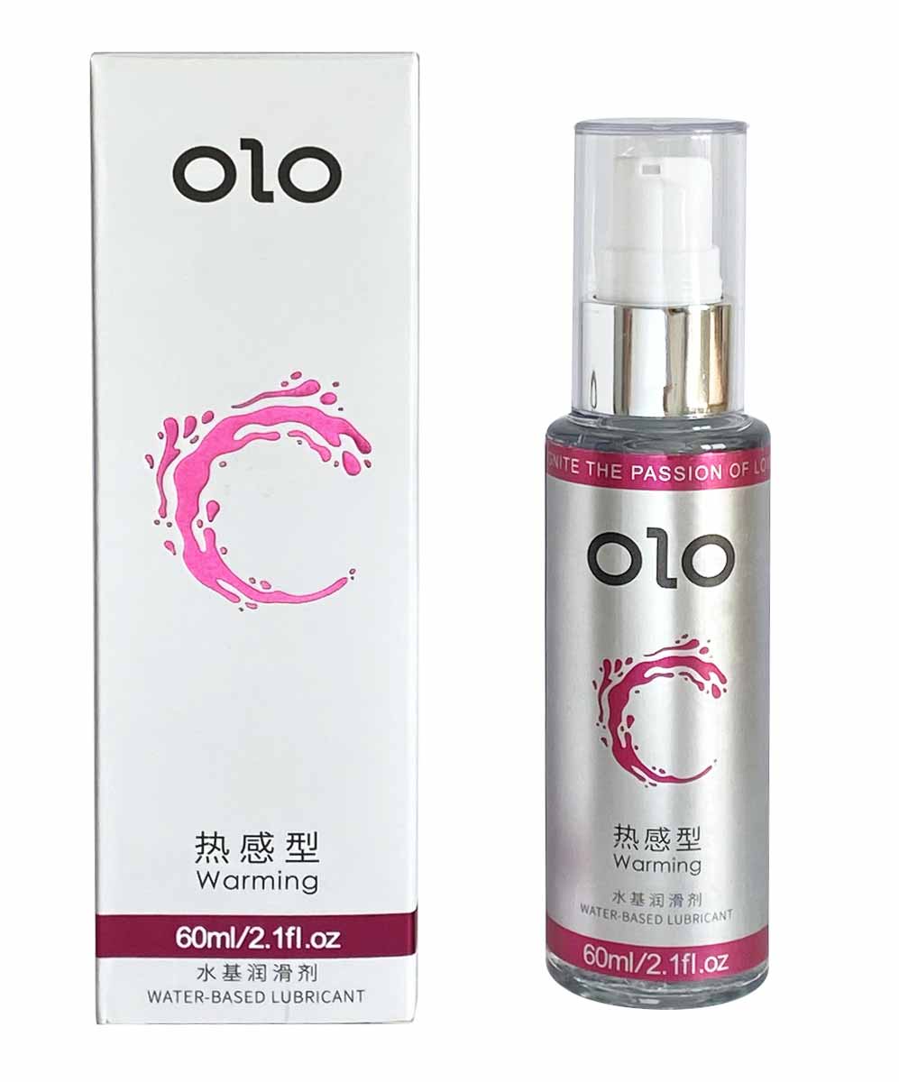 Два прозорі флакони лубрикантів OLO та рожеве кільце на білому фоні