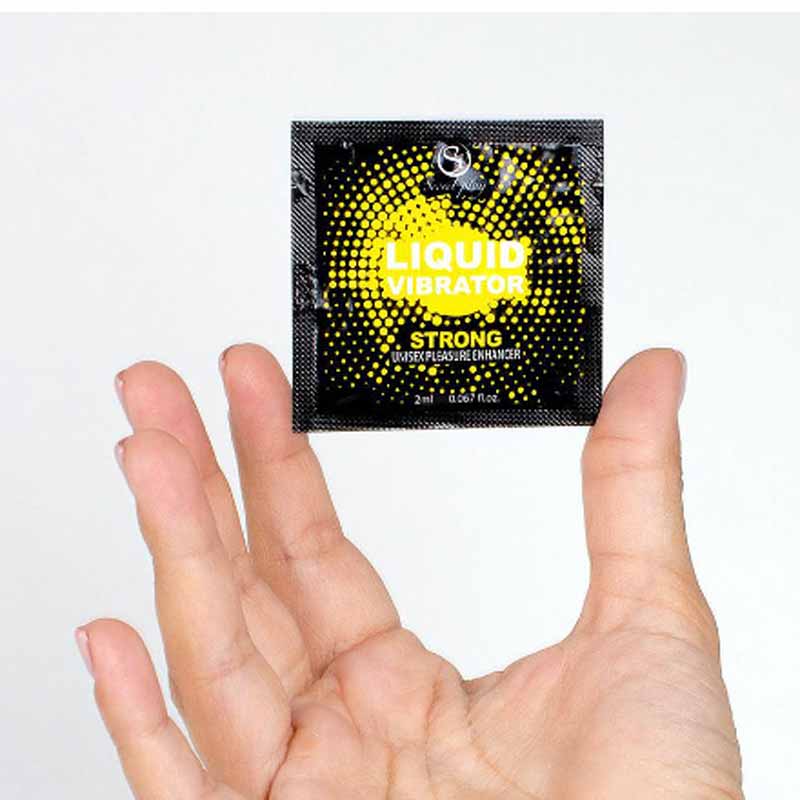 Рожева туба SecretPlay Strong Liquid Vibrator 2мл на білому фоні