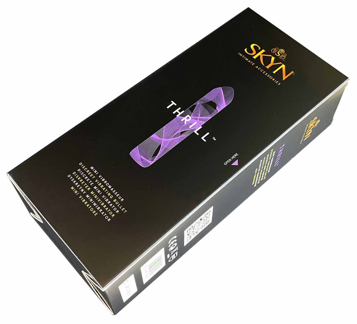 Чорний силіконовий еротичний кільце SKYN, прозорий флакон лубриканта olo, білий фон